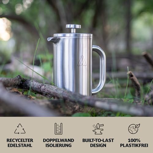 Cafetière à piston posée sur bois en extérieur avec pictogrammes caractéristiques techniques