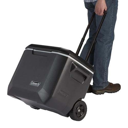 Glacière Coleman tractée avec poignée télescopique et roues robustes pour transport facile
