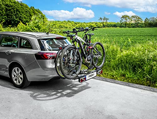 EUFAB Poker-F transportant 2 vélos sur voiture grise en campagne
